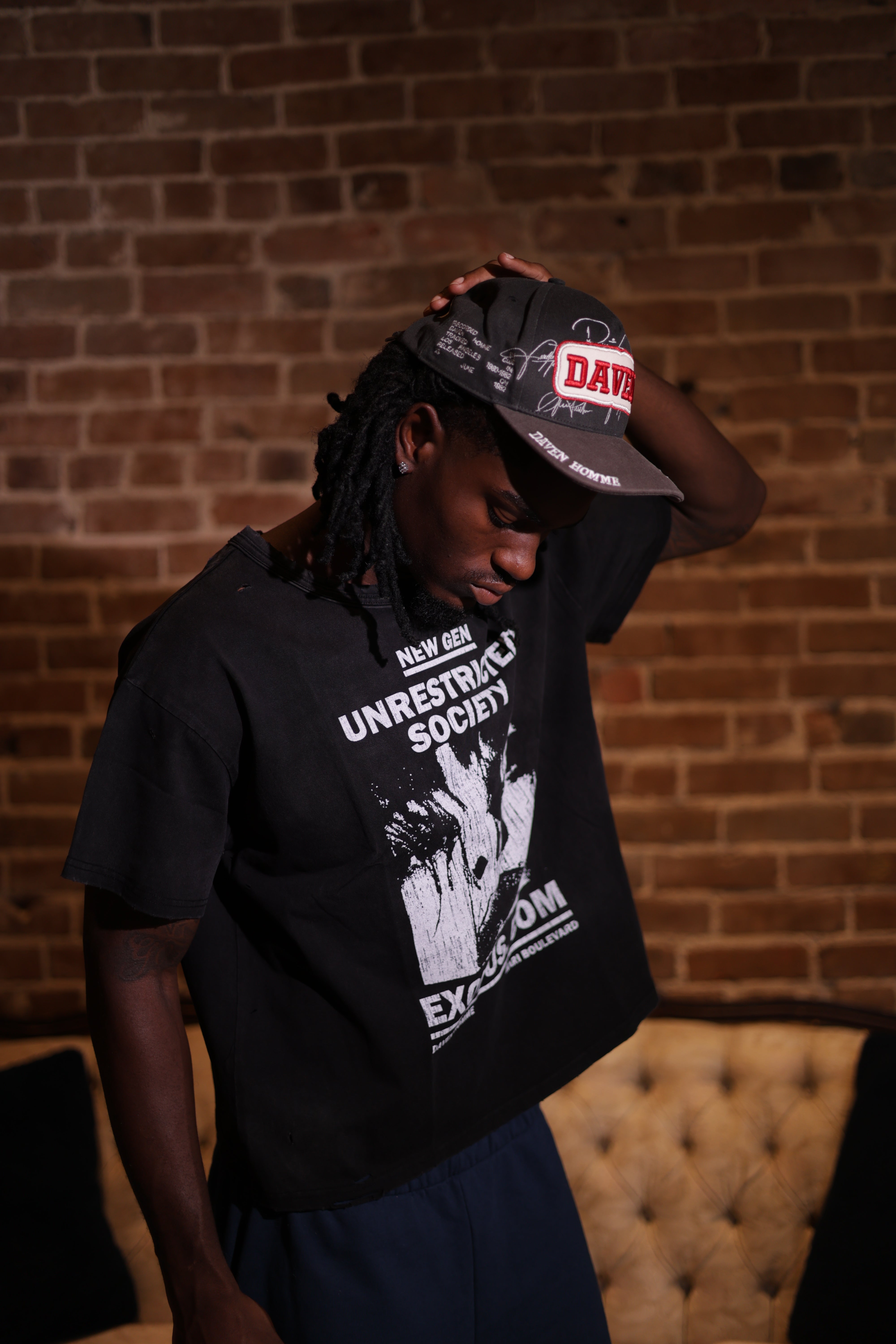 UNRESTRICTED SOCIETY BLACK TEE