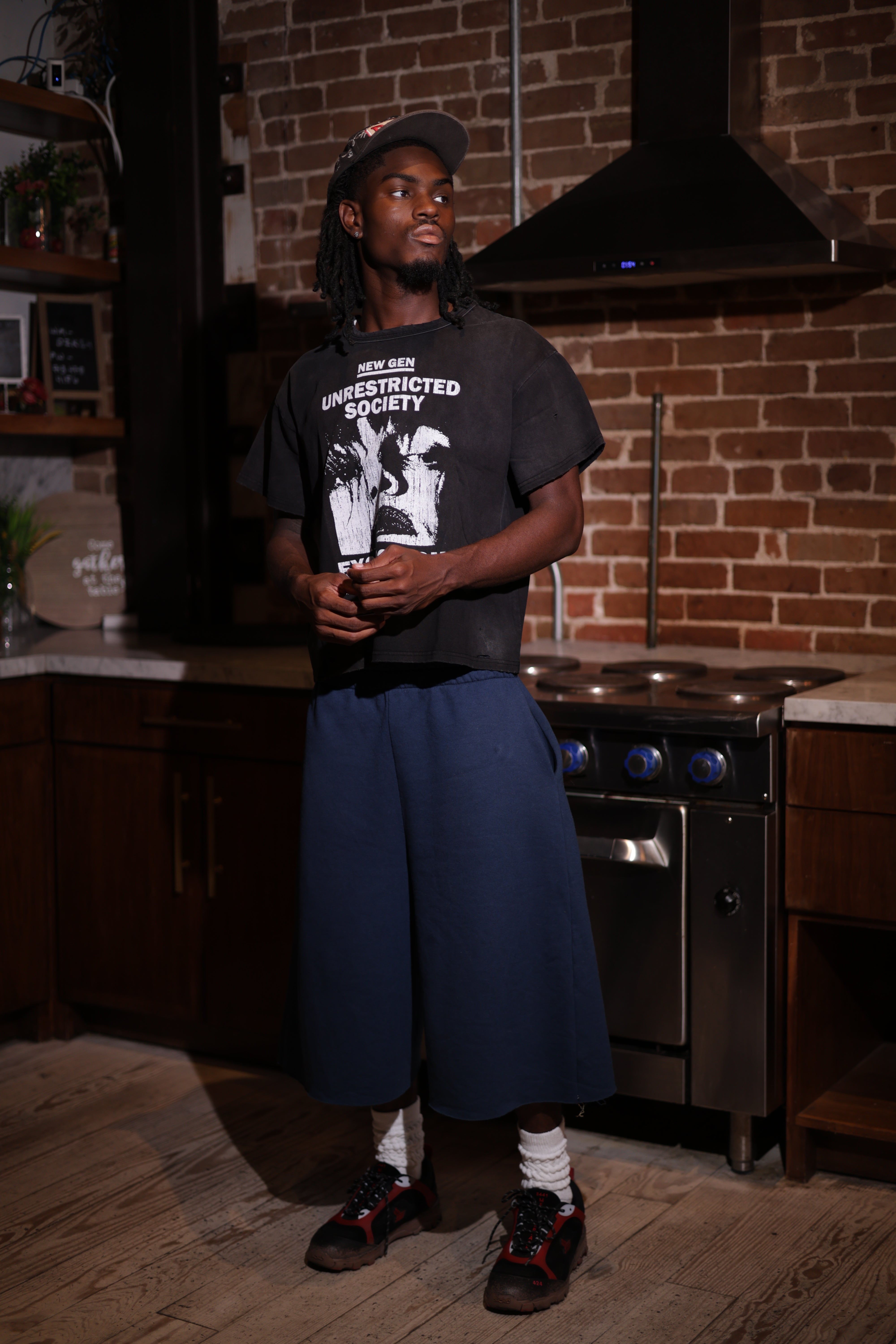 UNRESTRICTED SOCIETY BLACK TEE
